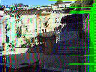 SSTV encoding an image in a sound and transmitting it through the sun light beam of the spectraphone and demodulating it